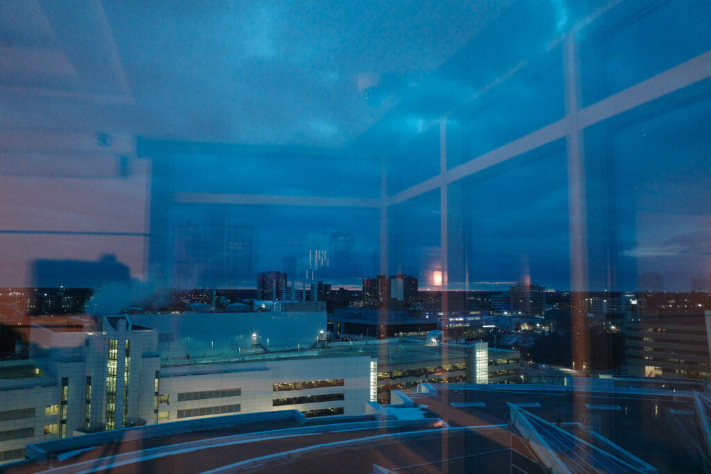 view of windsor with reflection of hotel in window