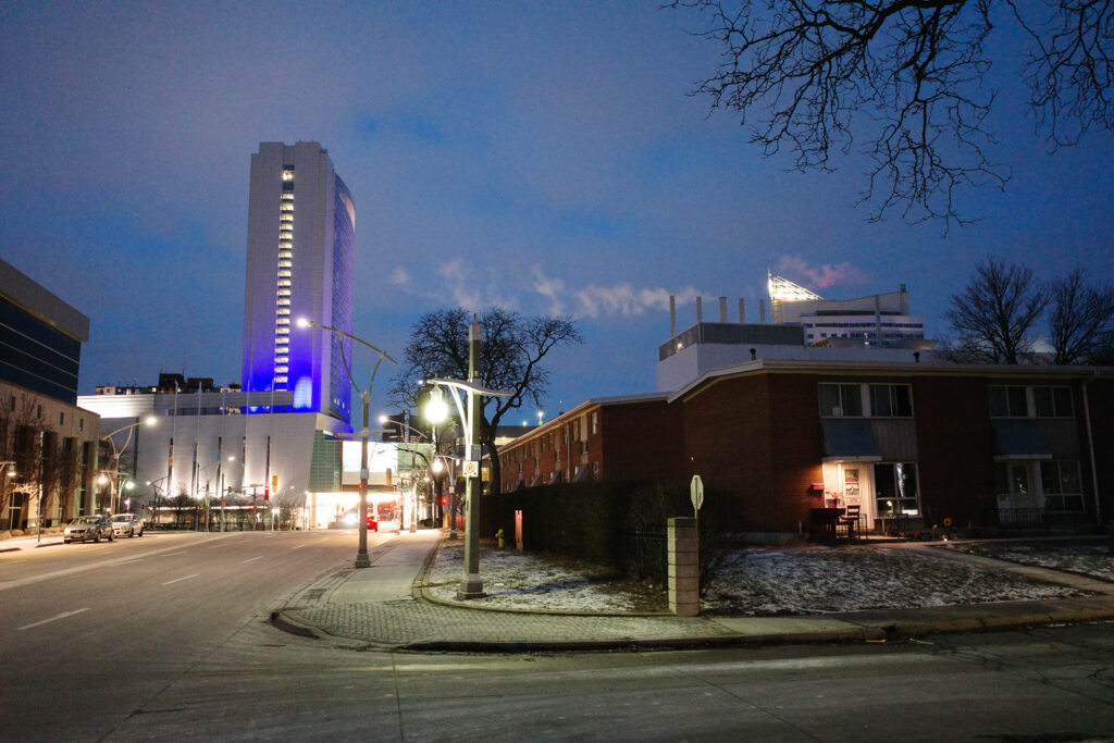 view of apartment building with casino in background