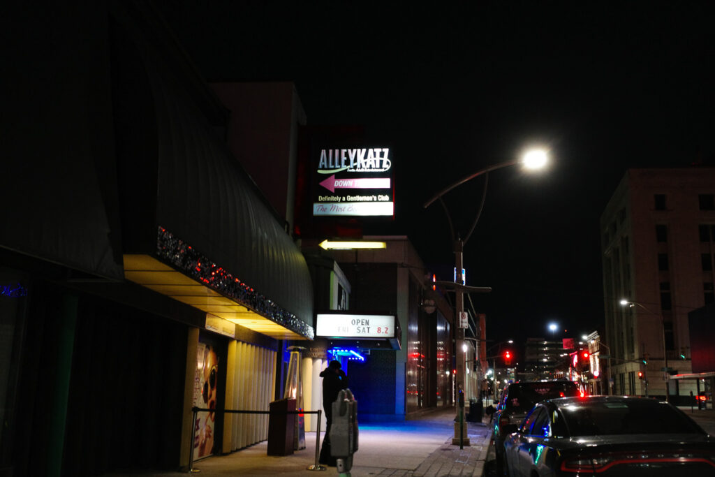 sign outside strip club alley katz