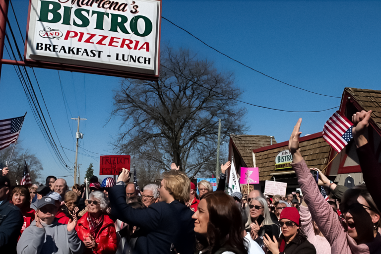 Rally with American flags outside Marlena's Bistro