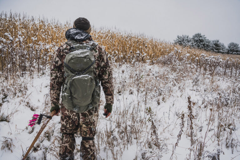 Bow hunter in snow