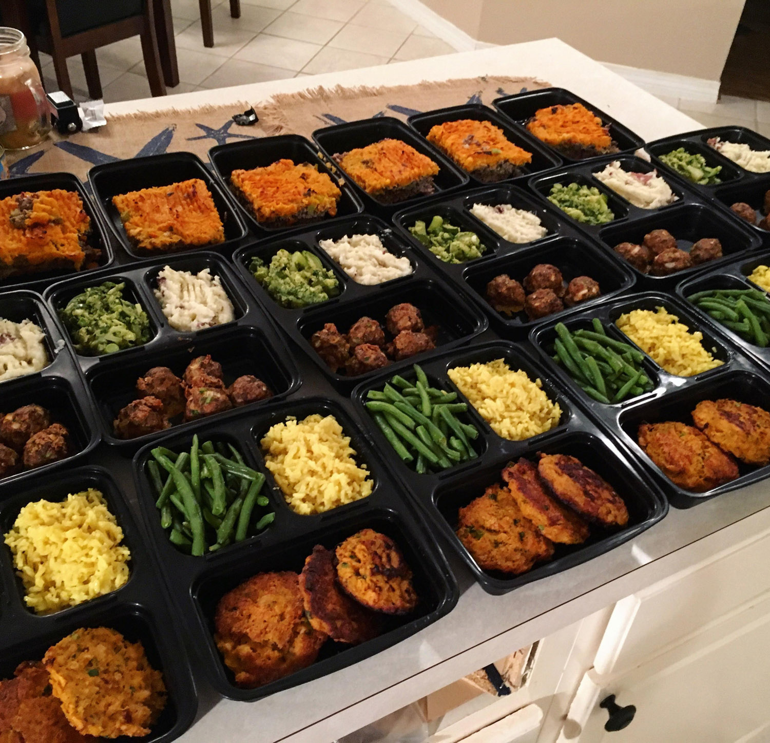 meal prepped food in plastic containers