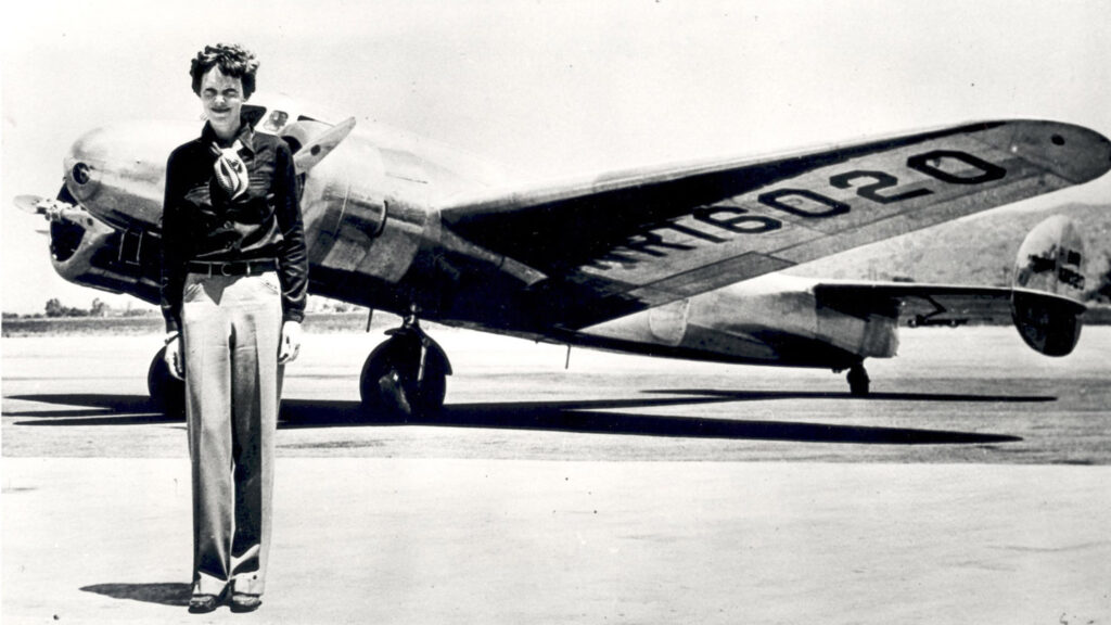 Amelia Earhart with plane