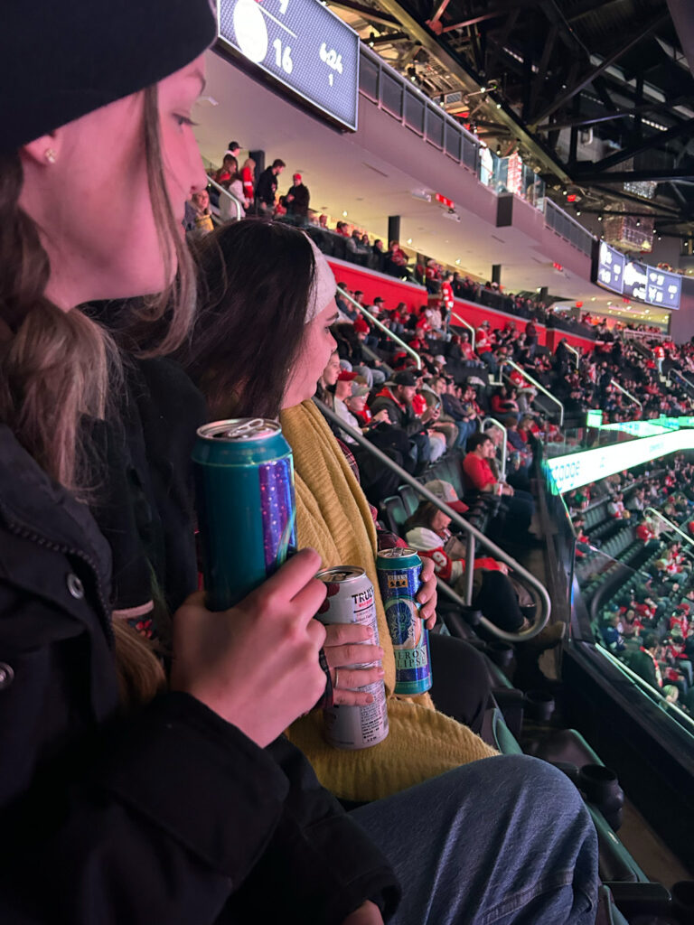 fans at red wings game with beers