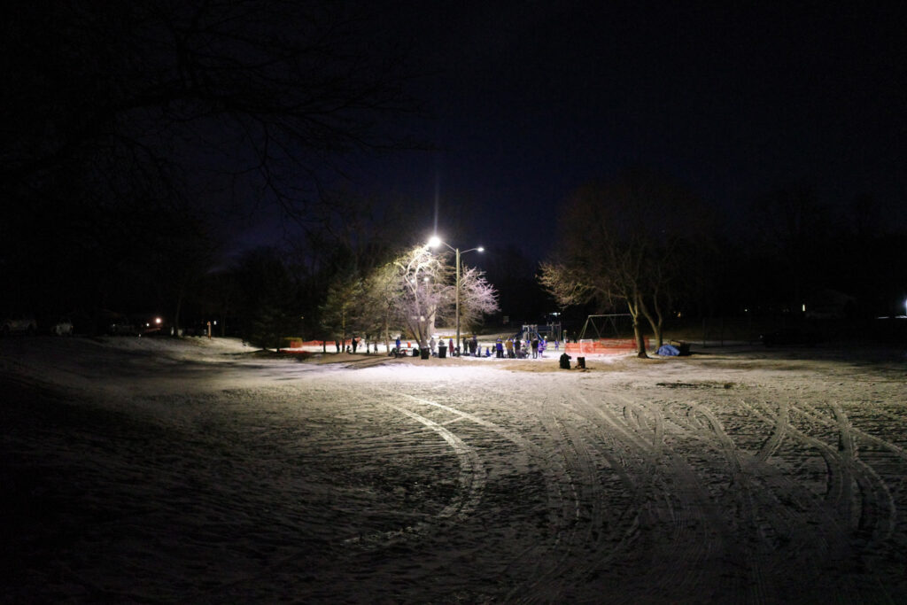 outdoor hockey rink at night