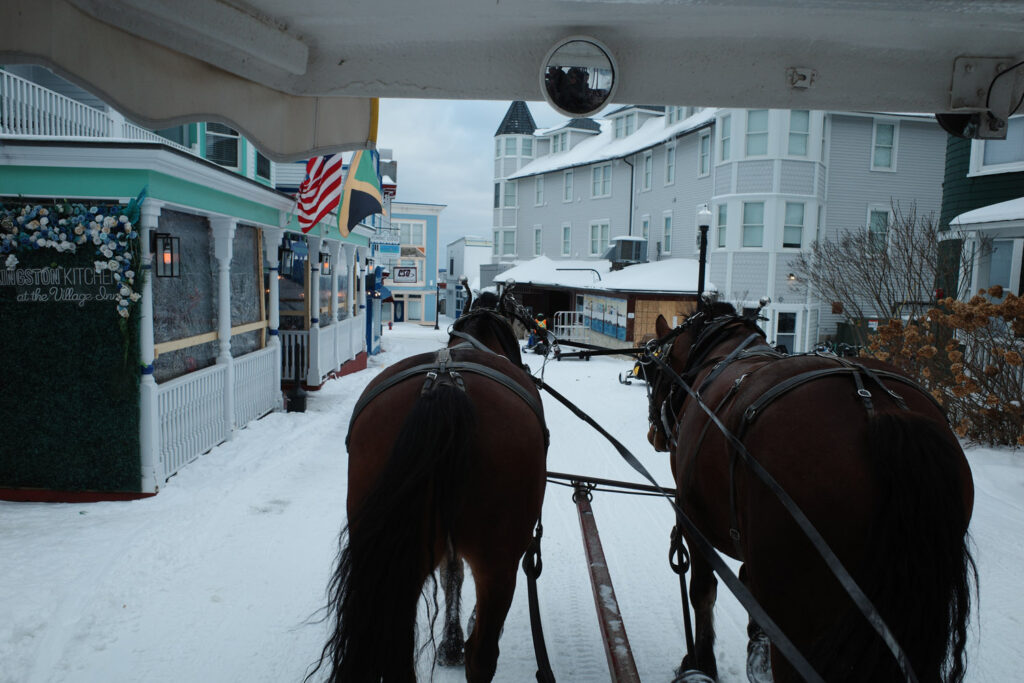 Horse drawn carriage in winter on Mackinac Island