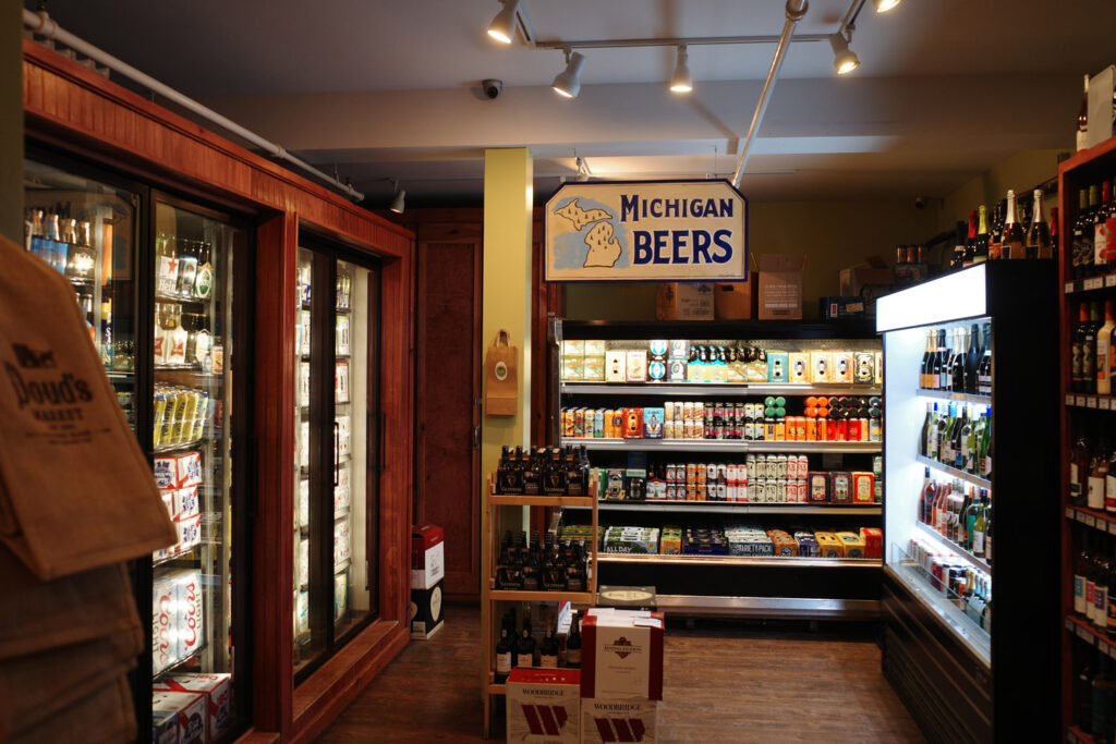 inside of grocery store with sign for Michigan Beers