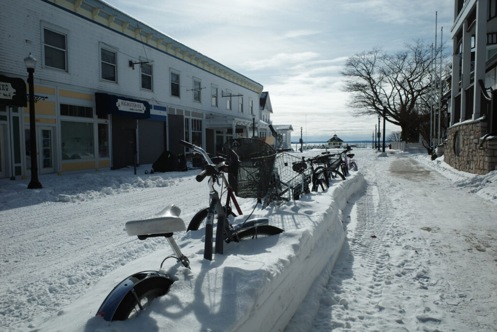 downtown street in snow on Mackinac Island