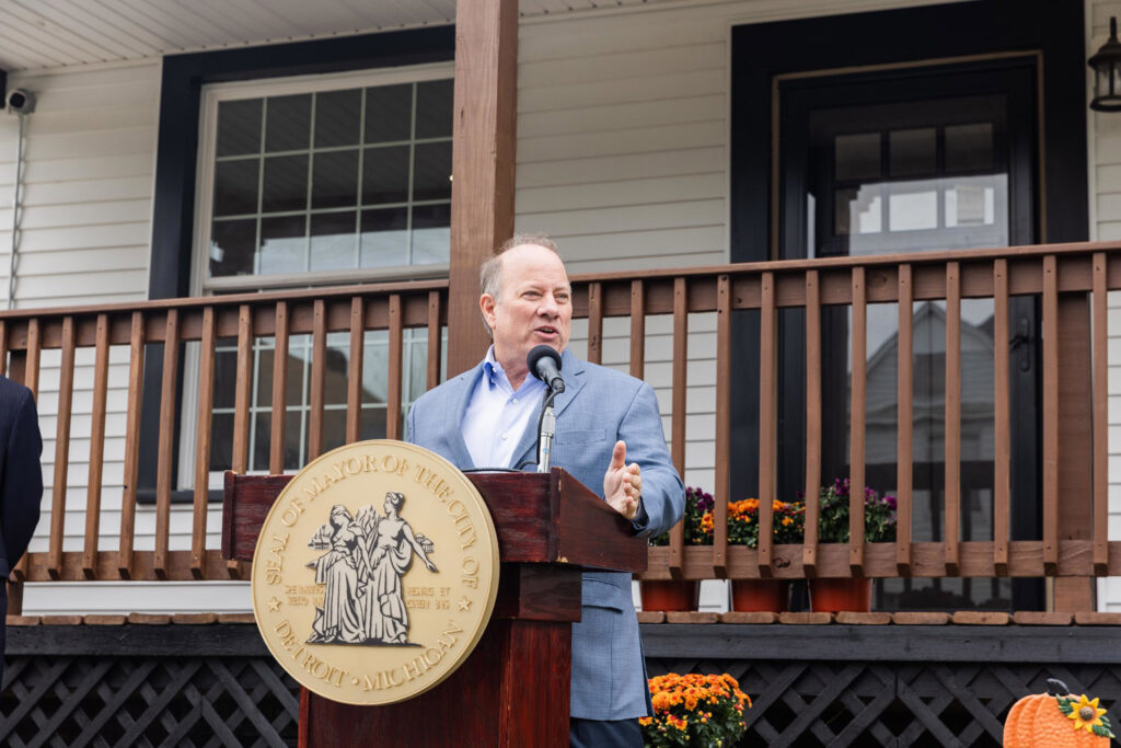 Mayor Duggan in blue coat