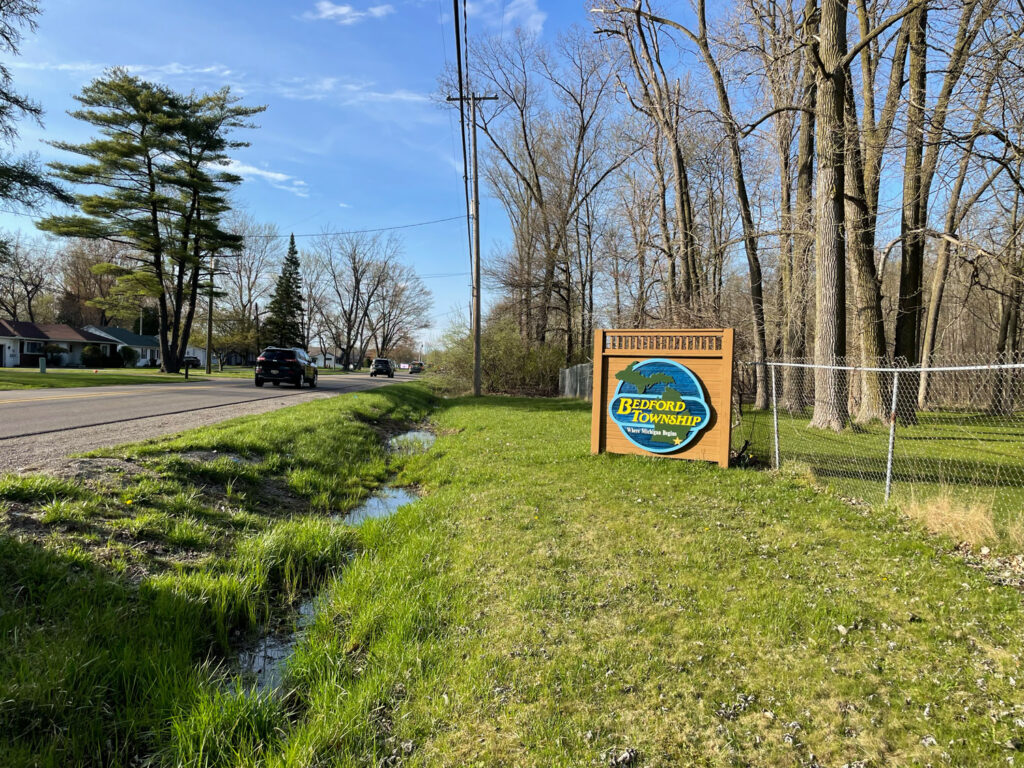 rural road and sign for bedford township