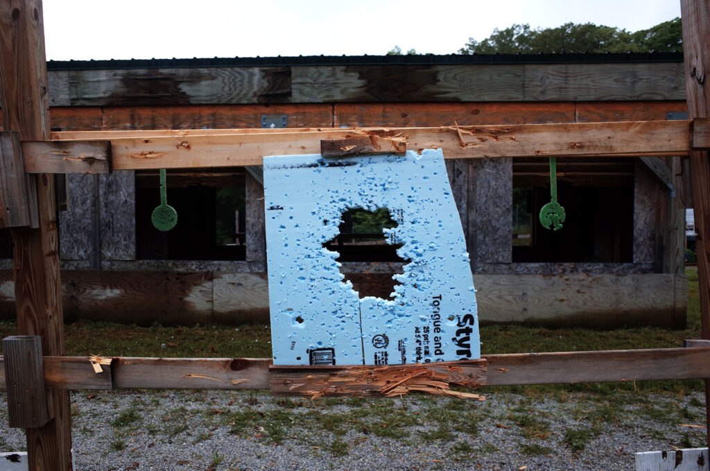 target with bullet holes at range