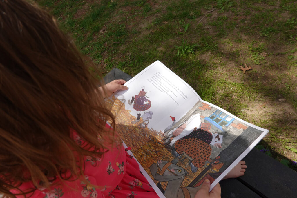 child reading book
