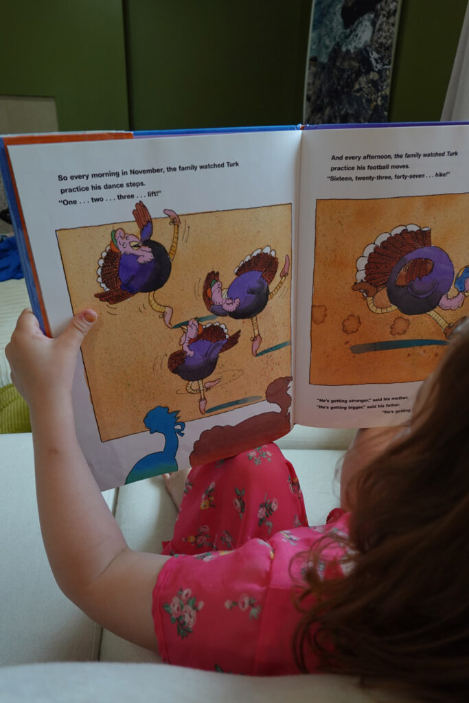 child reading book