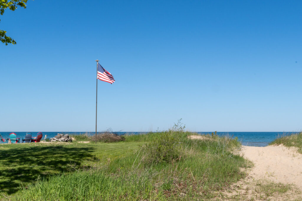 american flag on beach