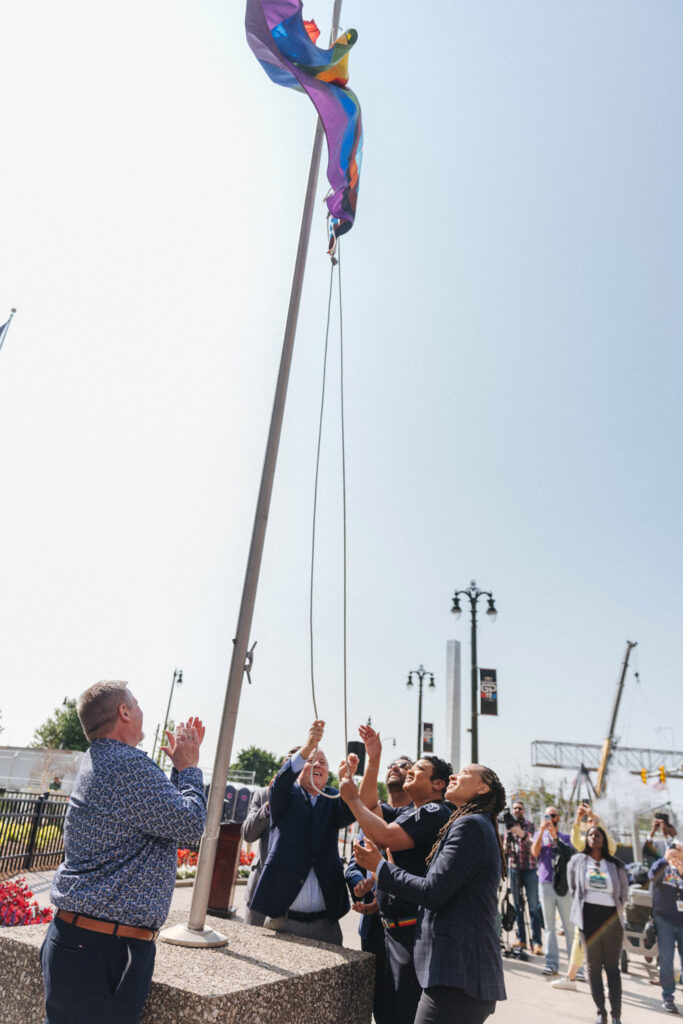 mayor mike duggan raising pride flag