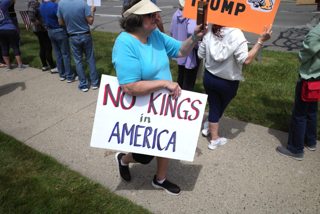 no kings protest boomers with anti-trump signs