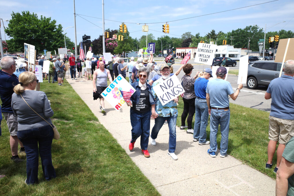 no kings protest boomers with anti-trump signs