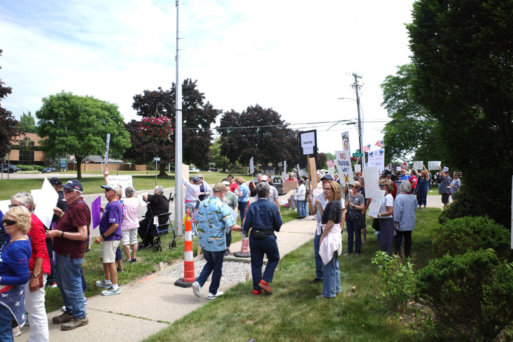 no kings protest boomers with anti-trump signs