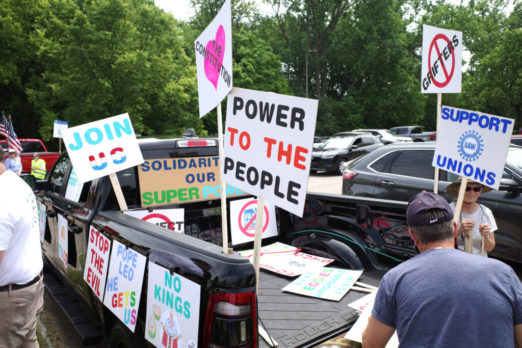 no kings protest boomers with anti-trump signs