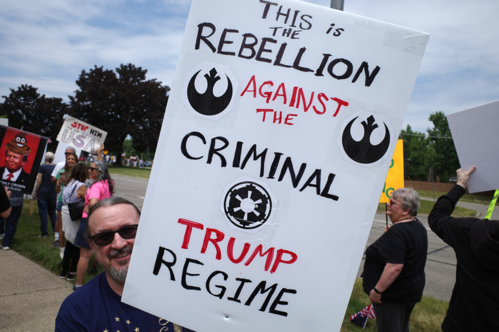 no kings protest boomers with anti-trump signs