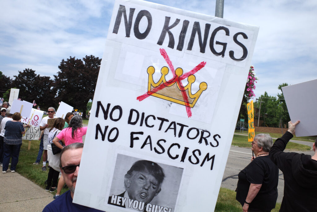 no kings protest boomers with anti-trump signs