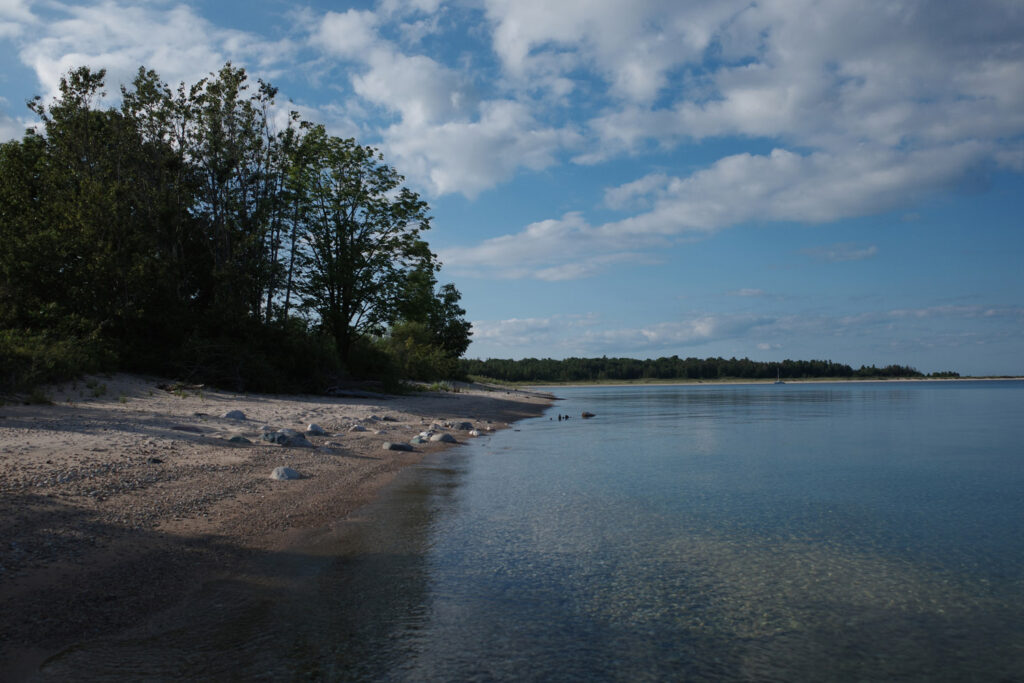 boating towards high island with ruins