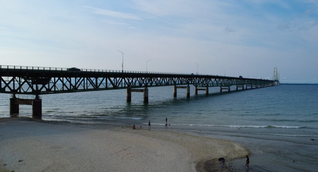 swimming under mackinac bridge