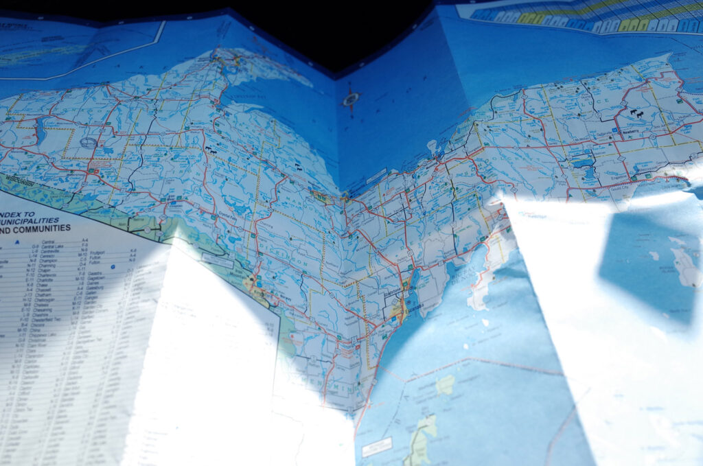 maps in car on road trip