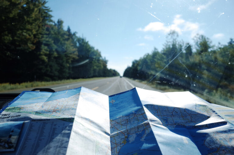 maps in car on road trip