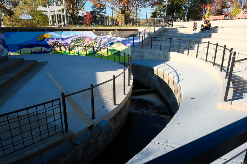 lansing fish ladder with needles and graffiti and trash