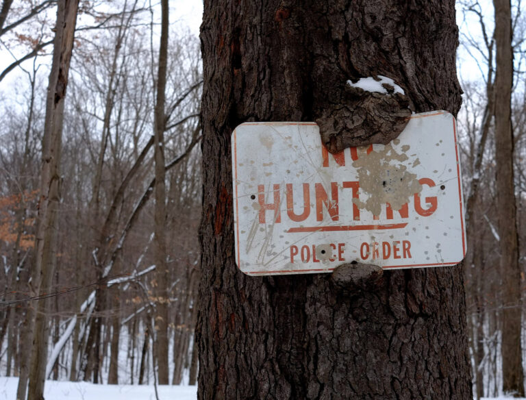 no hunting police order sign