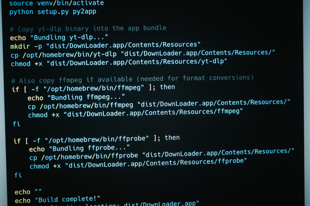 The image shows a terminal window with Python code and commands related to installing and using a Python application called "DownLoader.app". The code appears to be automating the process of downloading media files and resources.